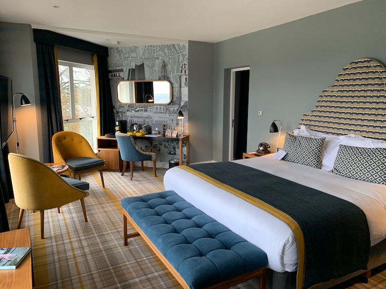 Warm hotel suite showcasing refined website imagery